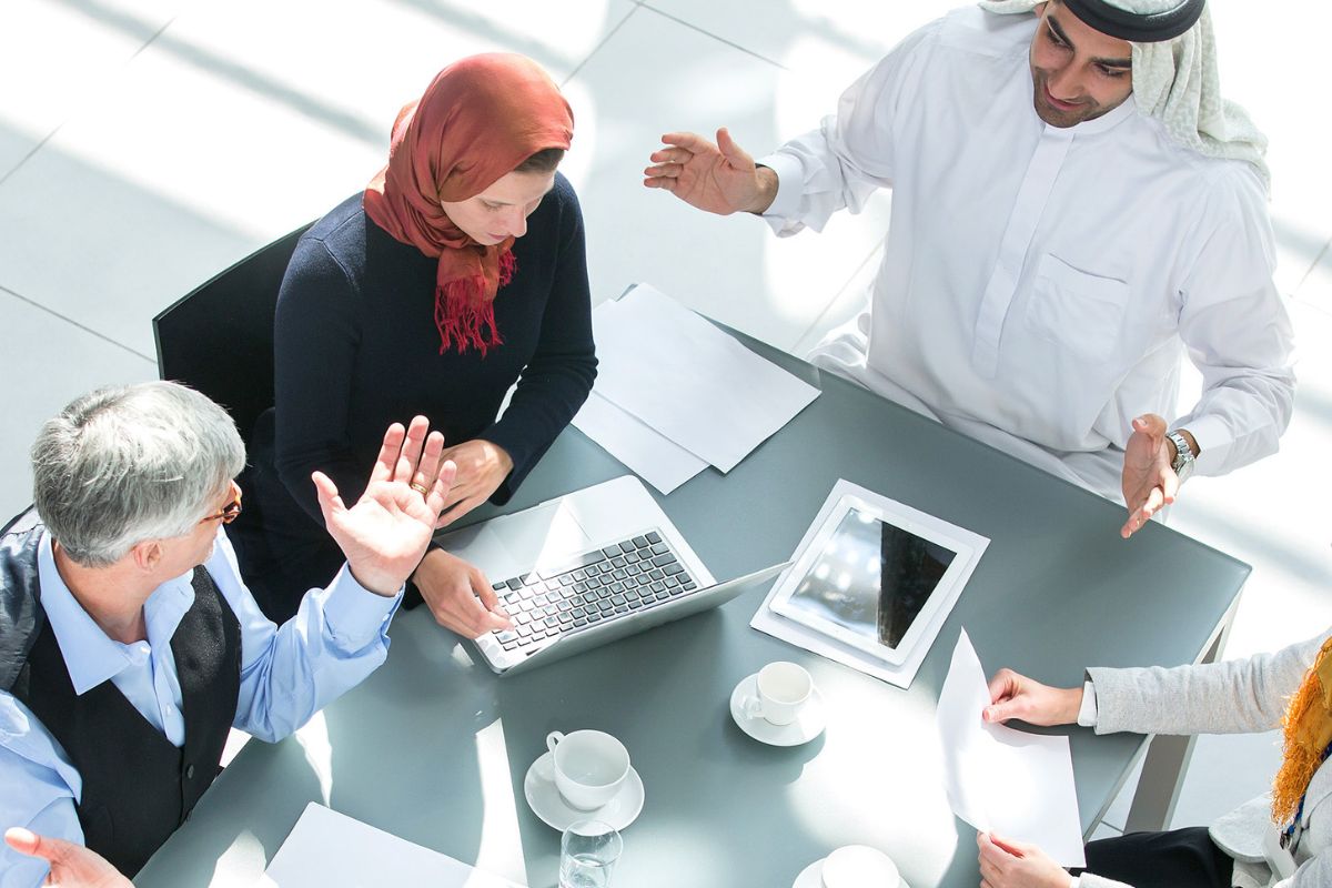 A professional team at Al ABWAB Document Clearing Services assisting clients with business setup and government-related procedures in Dubai. The image represents expert support in document clearing services Dubai, PRO services Dubai, visa services Dubai, and company formation Dubai. It highlights real-time solutions for trade license renewal Dubai, document typing services Dubai, and attestation services Dubai. Also featured are trusted services for mainland company formation Dubai, free zone company setup Dubai, and online document clearing services Dubai. Ideal for those searching for document clearing in Al Qusais, visa typing near me, or how to open business in Dubai with low investment. This visual captures the full process of the Dubai company license process, including documents required for UAE visa and trade licence.